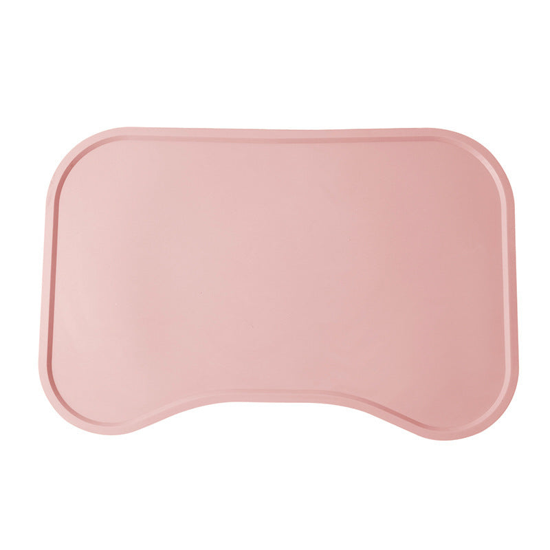 Pink raised-edge silicone pet food mat
