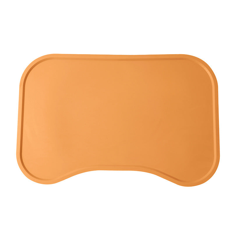 Snaggoo cat food mat in orange, raised-edge waterproof non-slip silicone