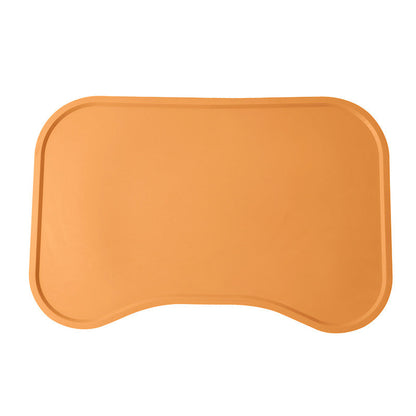 Snaggoo cat food mat in orange, raised-edge waterproof non-slip silicone