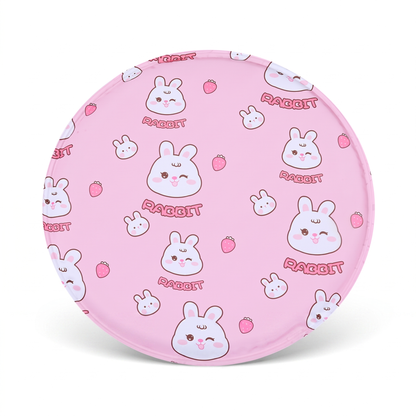 Snaggoo round cat cooling gel mat, angled view showing flat pad, piped edge and pink rabbit print
